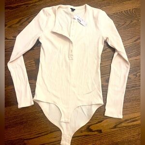 New with tags! Cotton button up Henley bodysuit.